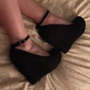 Black suede wedge heel shoes with ankle straps